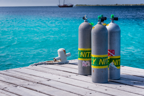 Scuba cylinders on a dock, Caribbean Netherlands