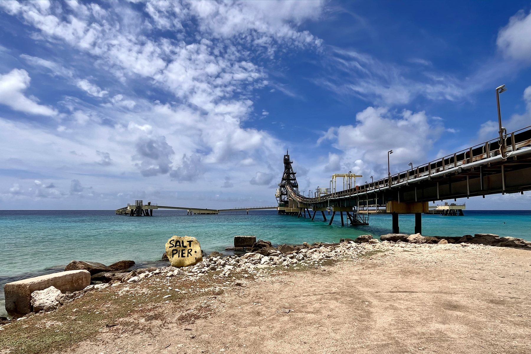 Salt Pier Bonaire's yellow stone